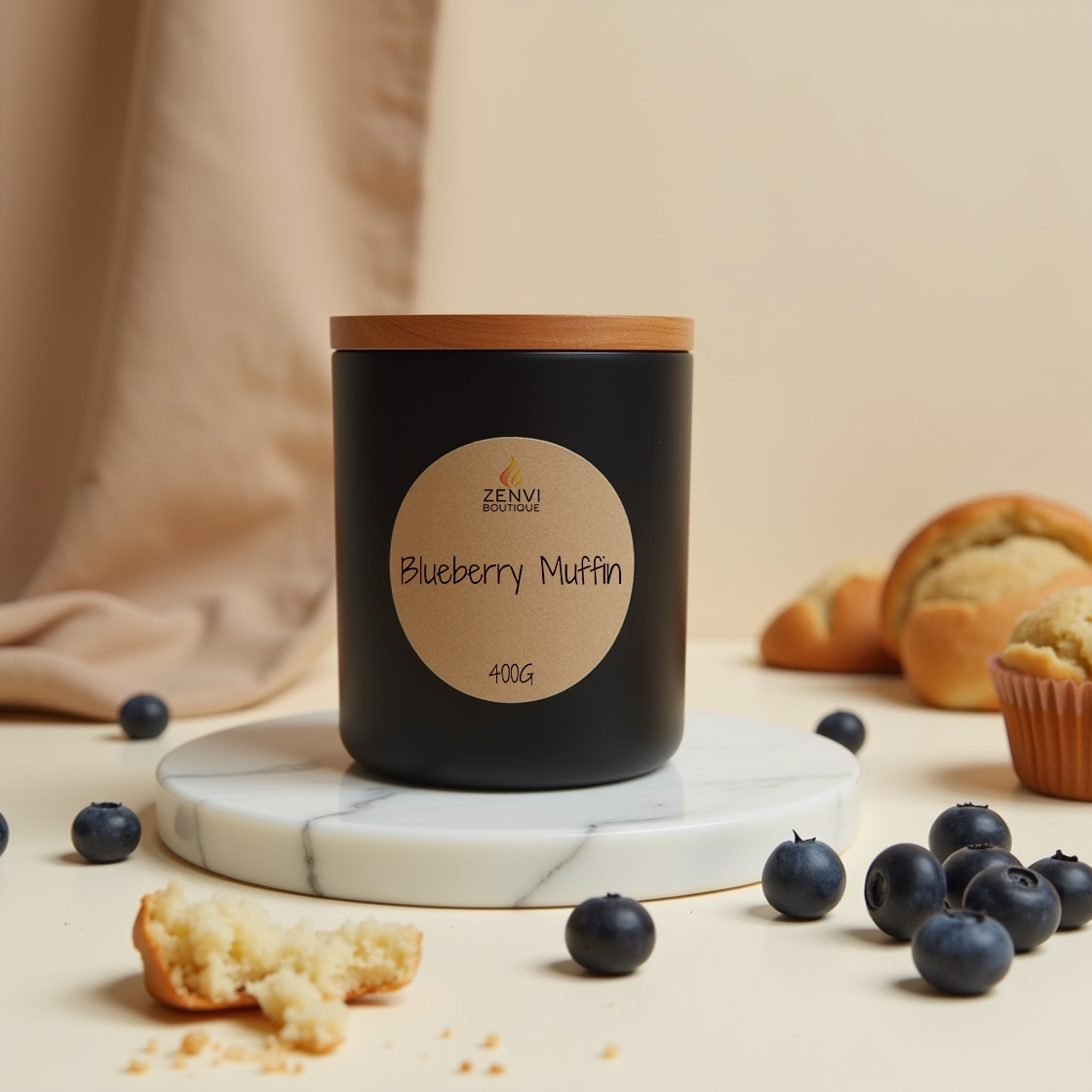 A warm Blueberry Muffin scented soy candle in a matte black jar.