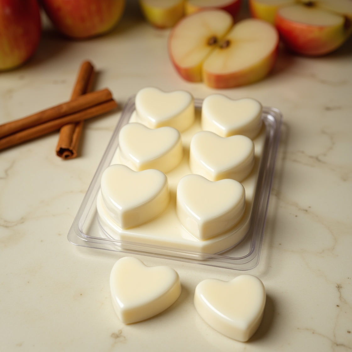 A pack of warm Cinnamon Apple scented soy wax melts.