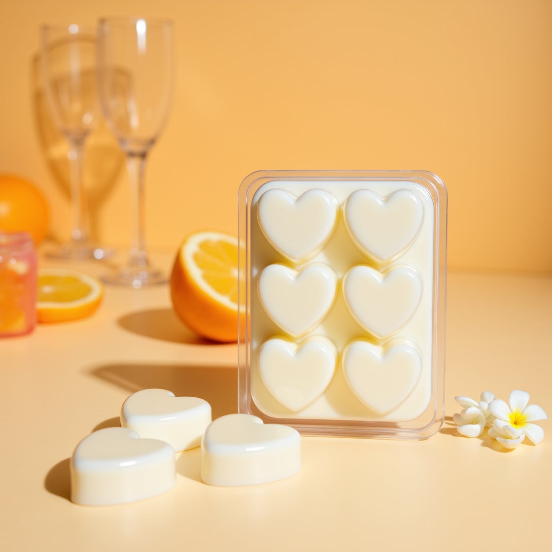 A pack of bright Mimosa & Mandarin scented soy wax melts.