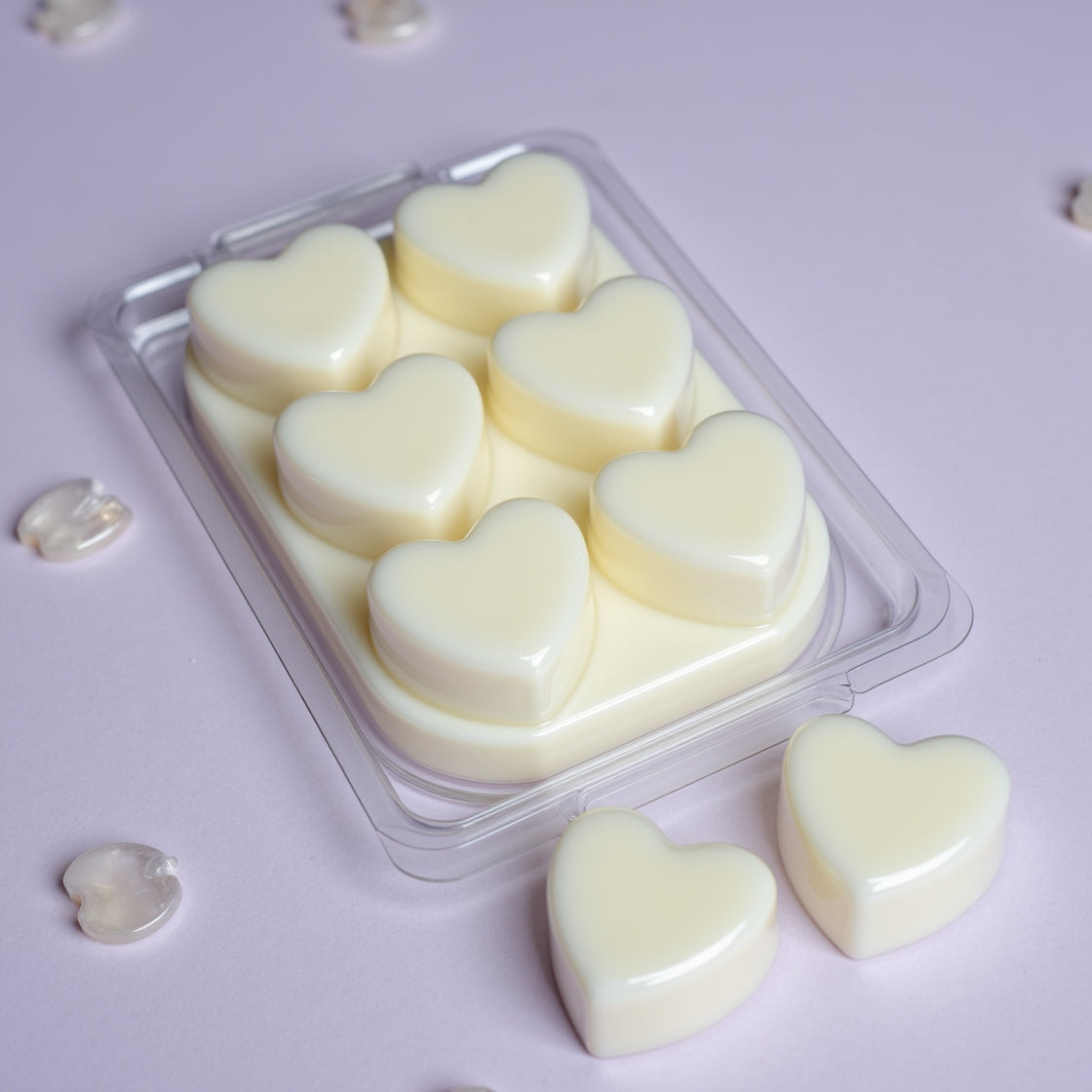 A pack of shimmery Stardust scented soy wax melts in a clamshell.