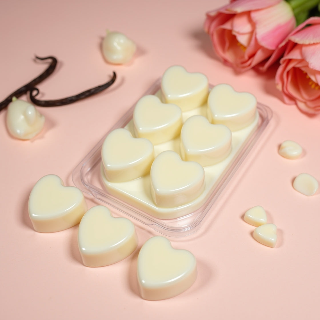 A pack of heart-shaped Sweet Pea & Vanilla soy wax melts in a clamshell.